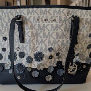 Authentic Michael Kors Blue Leather Handbag with Flower Motif